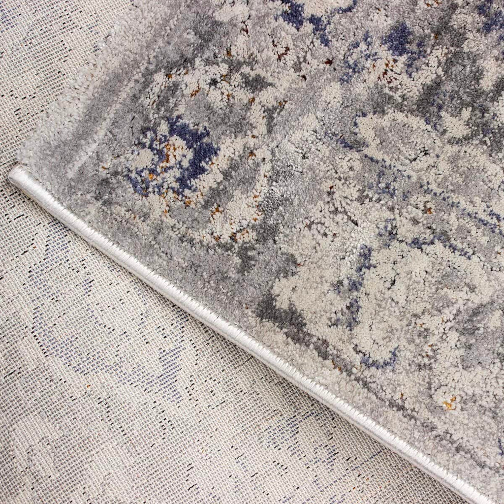 Tapete Bursa 26 azul con textura suave y diseño contemporáneo ideal para sala o recámara en espacios modernos