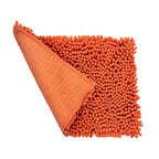 Tapete de baño Shaggy Coral 40x60 cm con textura suave y diseño contemporáneo ideal para baño en espacios modernos