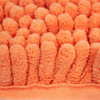 Tapete de baño Shaggy Coral 40x60 cm con textura suave y diseño contemporáneo ideal para baño en espacios modernos