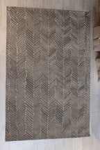 Tapete Bazhars Dhurrie Tie multicolor con textura natural y diseño contemporáneo ideal para sala o recámara en espacios modernos