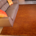 Tapete Bazhars Primavera Super naranja con textura suave y diseño contemporáneo ideal para sala o recámara en espacios modernos
