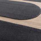 Tapete Ray 24511 negro con textura suave y diseño contemporáneo ideal para sala o recámara en espacios modernos