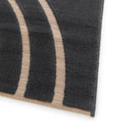 Tapete Ray 24535 negro con textura suave y diseño contemporáneo ideal para sala o recámara en espacios modernos