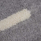 Tapete Shaggy Supreme gris con fibras largas y textura esponjosa que brinda confort y calidez en espacios interiores