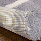 Tapete Shaggy Supreme gris con fibras largas y textura esponjosa que brinda confort y calidez en espacios interiores