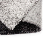Tapete Softness gris con textura suave y diseño contemporáneo ideal para sala o recámara en espacios modernos