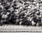 Tapete Softness gris con textura suave y diseño contemporáneo ideal para sala o recámara en espacios modernos