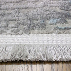 Tapete Sophistic gris/azul con combinación de tonos elegantes y diseño contemporáneo ideal para complementar espacios modernos
