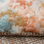 Tapete Stella crema/naranja 80x150 cm con textura suave y diseño contemporáneo ideal para recámara o pie de cama en espacios modernos