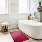Tapete baño Memory Coat fucsia 45x75 cm con textura suave y diseño contemporáneo ideal para baño en espacios modernos