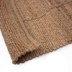 Tapete Yute Cassava Loose con textura natural y diseño contemporáneo ideal para sala o recámara en espacios modernos