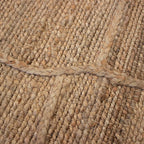 Tapete Yute Cassava Loose con textura natural y diseño contemporáneo ideal para sala o recámara en espacios modernos