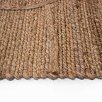 Tapete Yute Cassava Loose con textura natural y diseño contemporáneo ideal para sala o recámara en espacios modernos