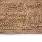 Tapete Yute Cassava Loose con textura natural y diseño contemporáneo ideal para sala o recámara en espacios modernos