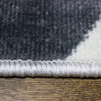 Tapete Shift chevron gris con textura suave y diseño contemporáneo ideal para sala o recámara en espacios modernos