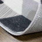 Tapete Shift chevron gris con textura suave y diseño contemporáneo ideal para sala o recámara en espacios modernos
