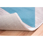 Tapete Shift triángulos azul 200x290 cm con textura resistente y diseño contemporáneo ideal para interior o exterior en espacios modernos